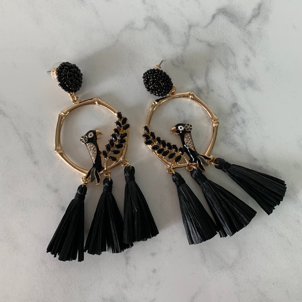A Black Birds Of A Feather Post Drop Metal Casting And Raffia Tassel Earring